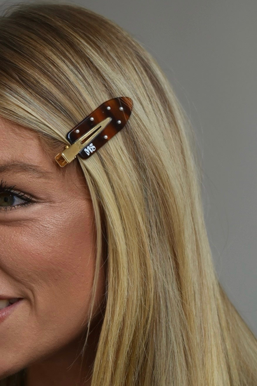 Non-crease clips met make-up en skincare producten – stijlvolle beauty accessoires